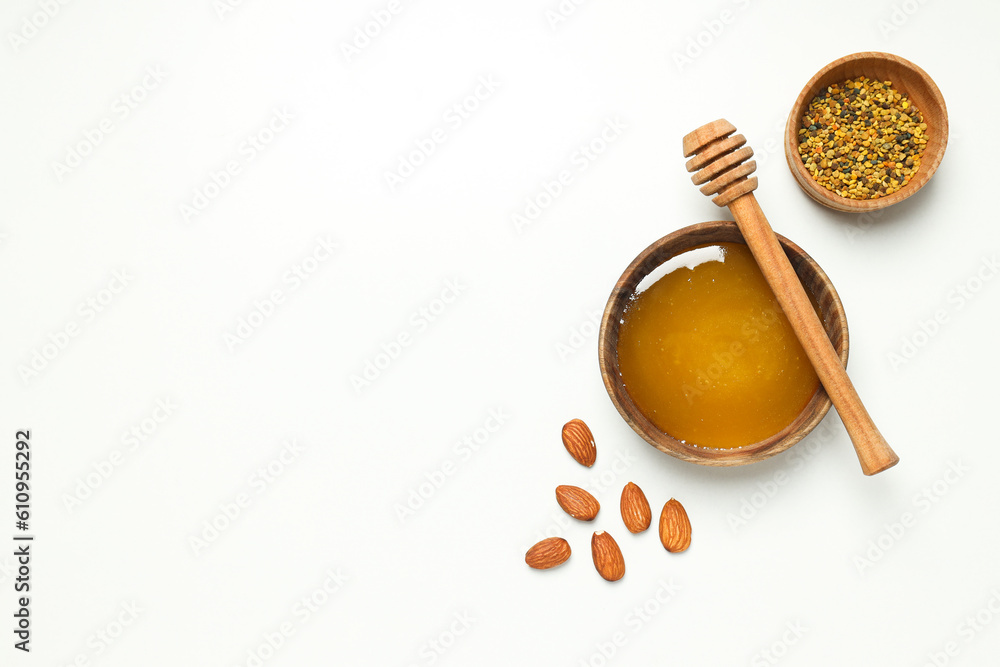 Concept of tasty and sweet food - honey with nuts Concept of tasty and sweet food - honey with nuts