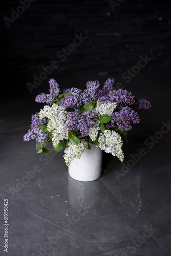 Wallpaper Mural White ceramic vase purple and white flowers on a dark background. Torontodigital.ca