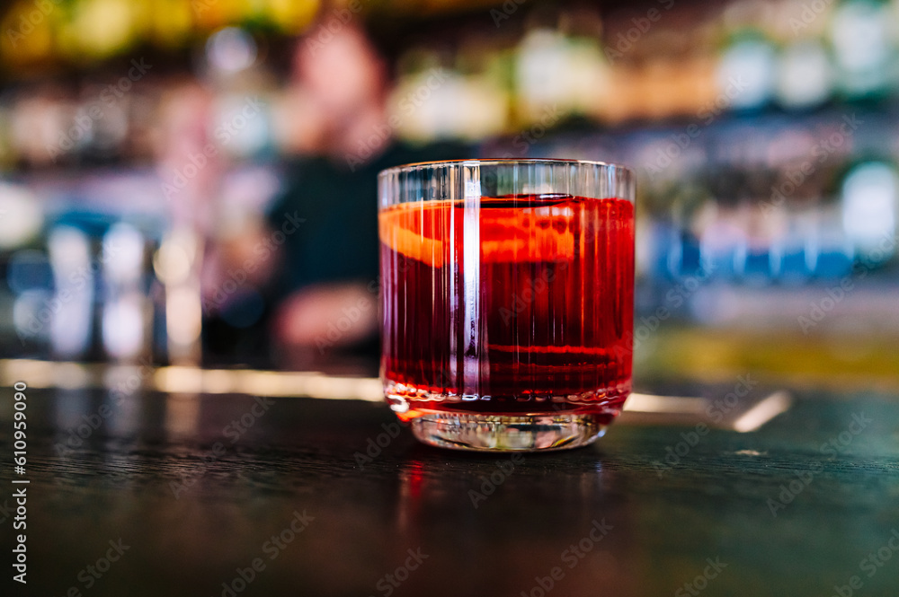 Cocktail Negroni with gin, campari martini rosso and orange. negroni