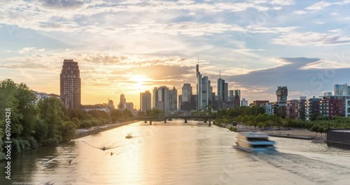Day to night timelapse of Frankfurt city skyline. Important commercial buildings of europes financial capital in 4k in the summertime.  photo