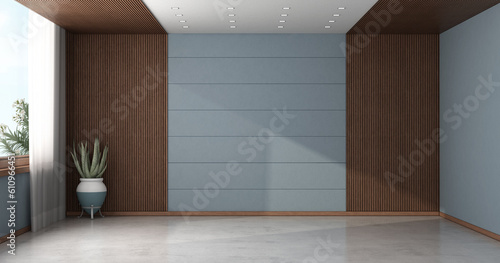 Fototapeta Naklejka Na Ścianę i Meble -  Empty room with wood paneling and blue wall