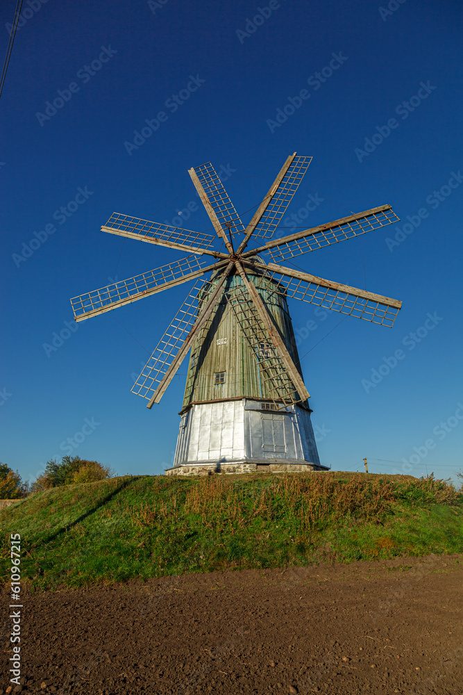 windmill dutch type against blue sky