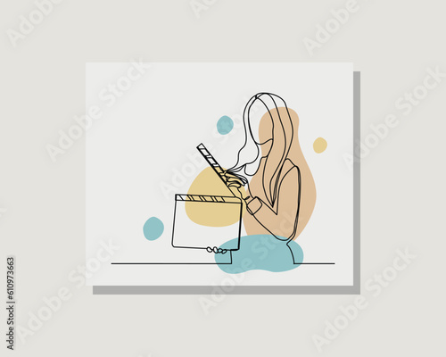 Continuous single one line art drawing of person holding film movie clapper board producer director film maker in boho style design vector illustration