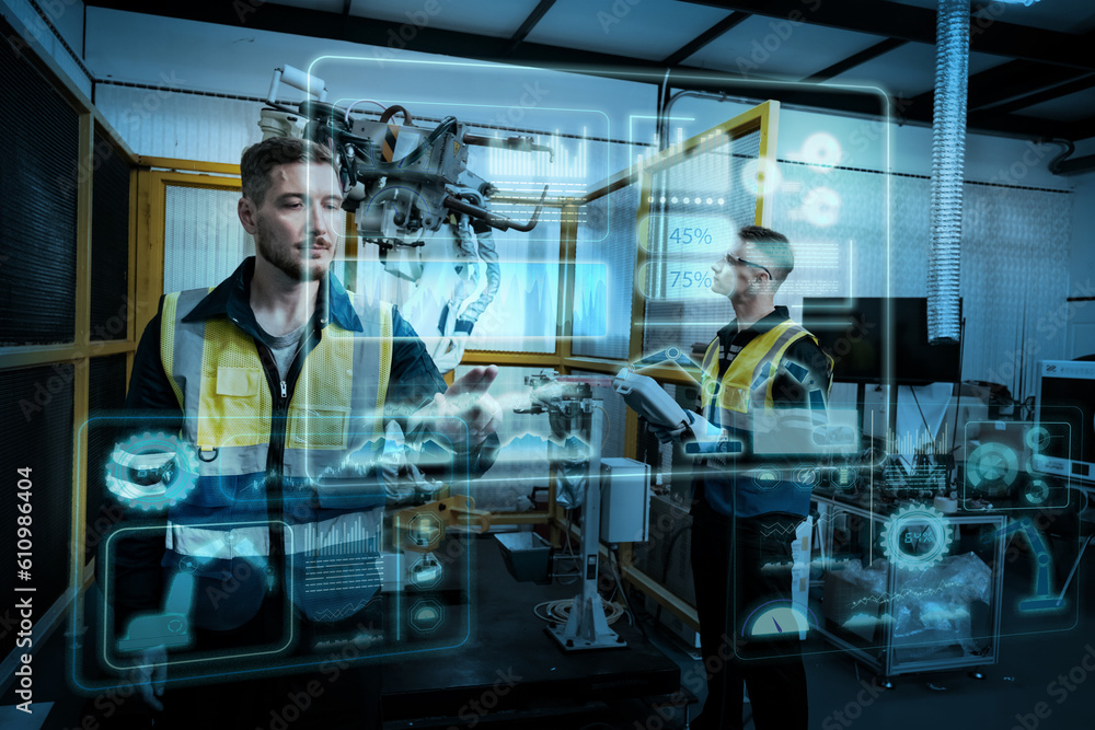 Multiracial tachnicial engineer training with robot arm