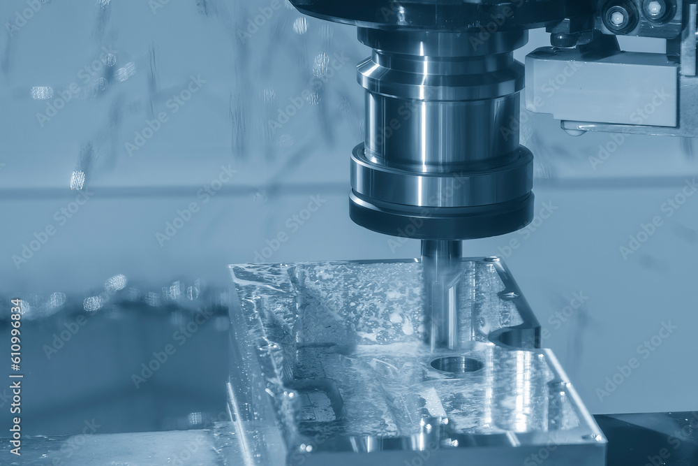The CNC milling machine rough cutting the aluminum housing with flat end mill tool. The CNC milling machine rough cutting the aluminum housing with flat end mill tool.