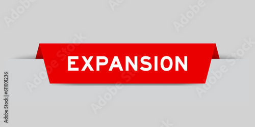 Red color inserted label with word expansion on gray background
