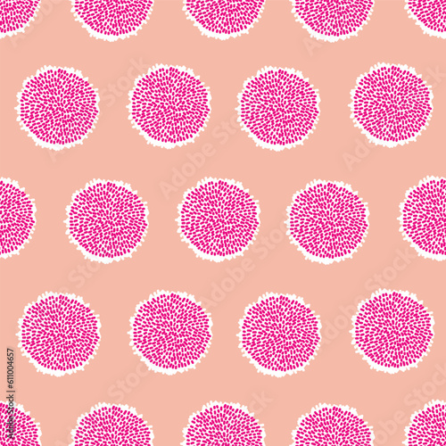 Vector seamless pattern pink pompoms or bobbles with white silhouette on the kind of peach fuzz background, regular pattern. 