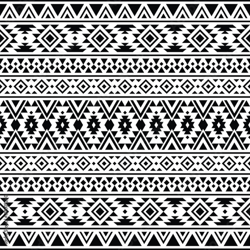 Abstract geometric seamless ethnic pattern with tribal Aztec motives. Vector texture design. Black and white colors. Design for textile, fabric, clothing, curtain, rug, ornament, wallpaper, wrapping.