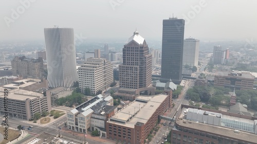 Downtown Rochester NY in dense smoke from Canadian wildfires blowing over city skyline caused by climate change
