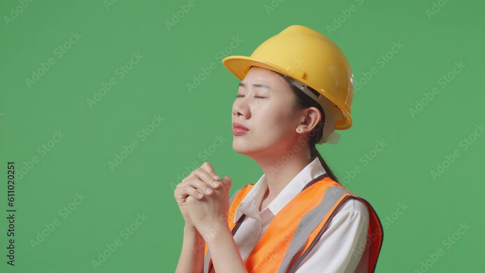 Close Up Side View Of Asian Female Engineer With Safety Helmet Pray For Something While Standing In The Green Screen Background Studio
Close Up Side View Of Asian Female Engineer With Safety Helmet Pray For Something While Standing In The Green Screen Background Studio