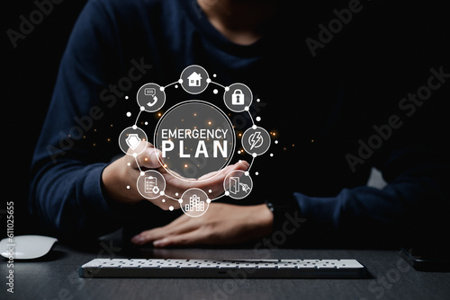 Business Evacuation Training concept. Concept of Emergency Preparedness Plan.Businessman touching Emergency Plan icon to learn and prepare in emergency situation
