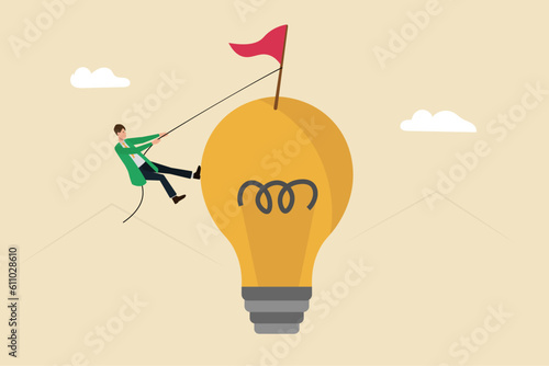 Hard work and creative effort to advance goals, ideas and business and personal development in life or business. A hardworking and creative business man climbing the lamp to reach the flag and conquer