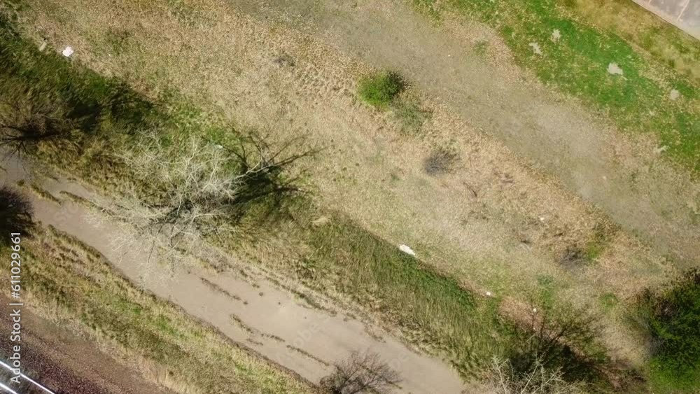 Aerial Shot Of Railroad Track By Field On Sunny Day - Billings, Montana Aerial Shot Of Railroad Track By Field On Sunny Day - Billings, Montana