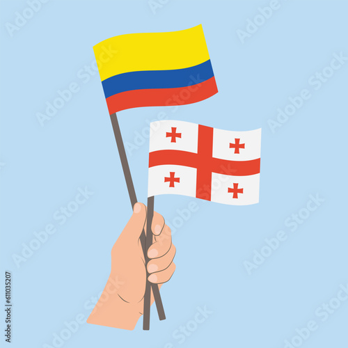 Flags of Colombia and Georgia, Hand Holding flags