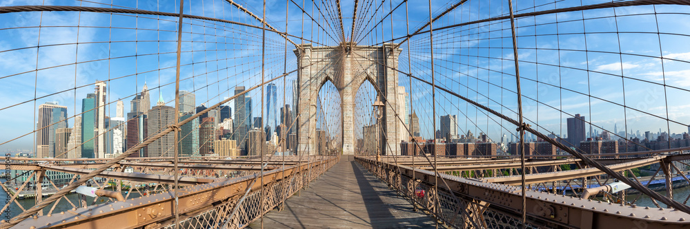 Fototapeta premium Brooklyn Bridge in New York City skyline of Manhattan with World Trade Center skyscraper panorama in the United States
