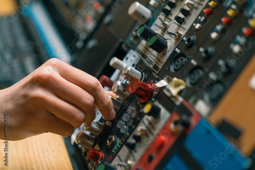 Sound Engineer Using Digital Audio Mixer Sliders Engineer Pressing Keys Control Panel Recording Studio Technician Close-up