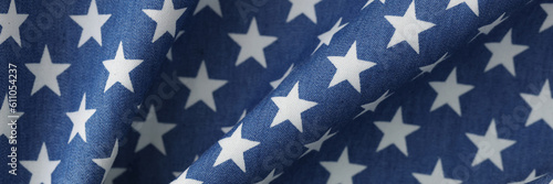 Navy blue wavy fabric with white stars texture background