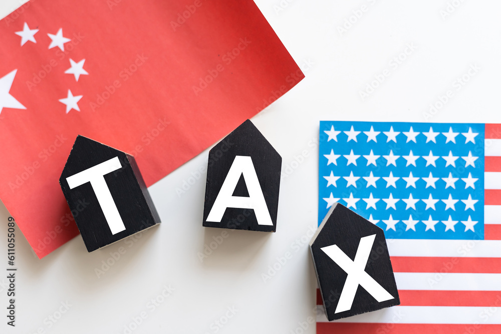 Tax text in wooden cubes and tax or vat form documents to complete Individual income tax return form for payment to Government. Calculation tax return in 2022 to 2023. - obrazy, fototapety, plakaty 