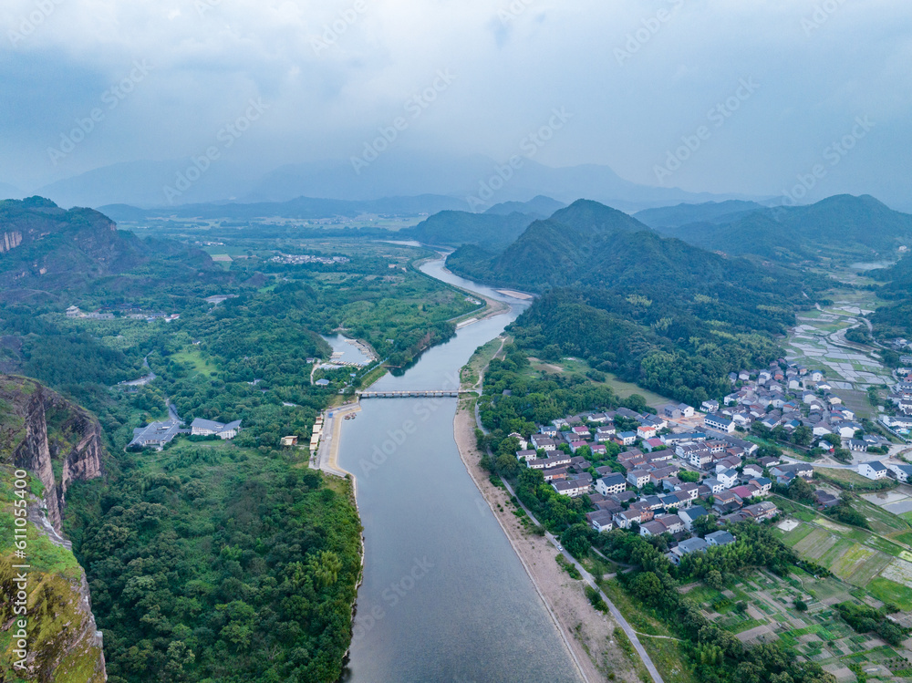 Overlook of Chinese rural houses and river scenery