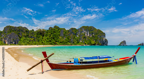 beautiful scenery of a boat on an island in thailand in perfect day scenery