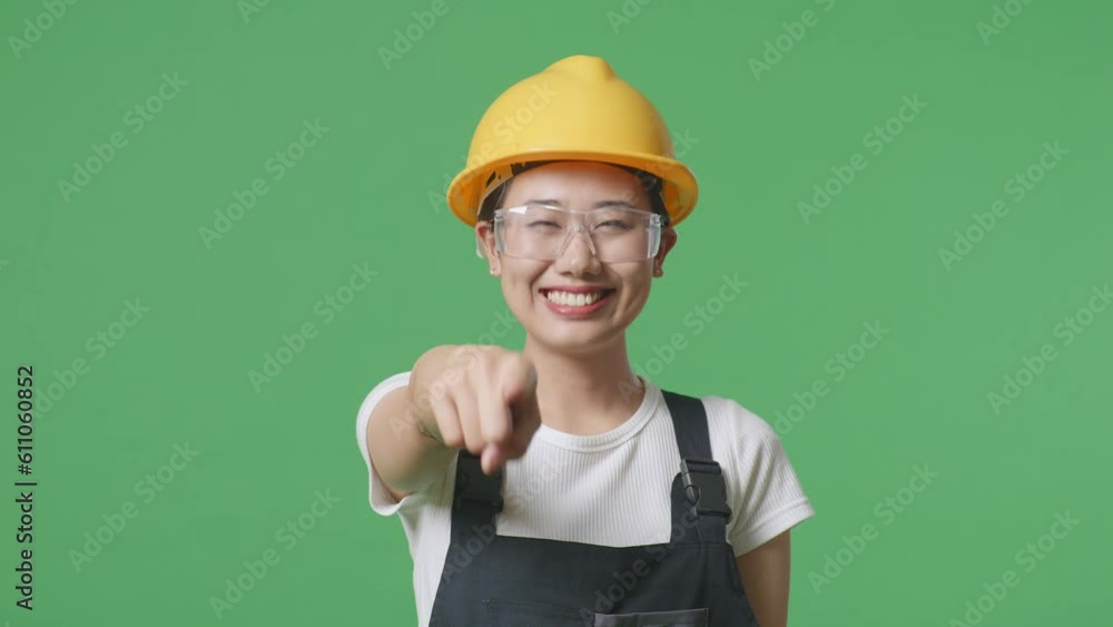 Close Up Of Asian Woman Worker Wearing Goggles And Safety Helmet Smiling And Touching Her Chest Then Pointing At You While Standing In The Green Screen Background Studio
Close Up Of Asian Woman Worker Wearing Goggles And Safety Helmet Smiling And Touching Her Chest Then Pointing At You While Standing In The Green Screen Background Studio
