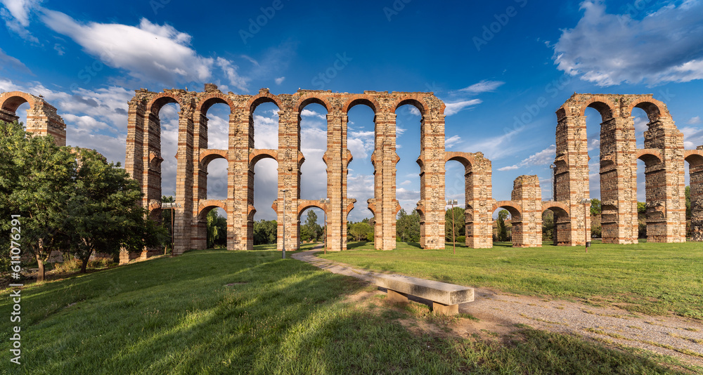Mérida's Aqueduct of Miracles at sunset, with its ancient Roman architecture and imposing stone columns, this historical relic is an emblem of cultural heritage.