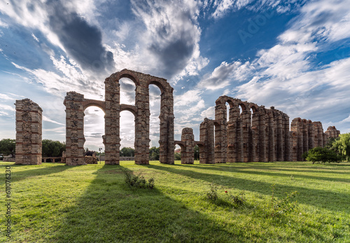 Mérida's Aqueduct of Miracles at sunset, with its ancient Roman architecture and imposing stone columns, this historical relic is an emblem of cultural heritage.