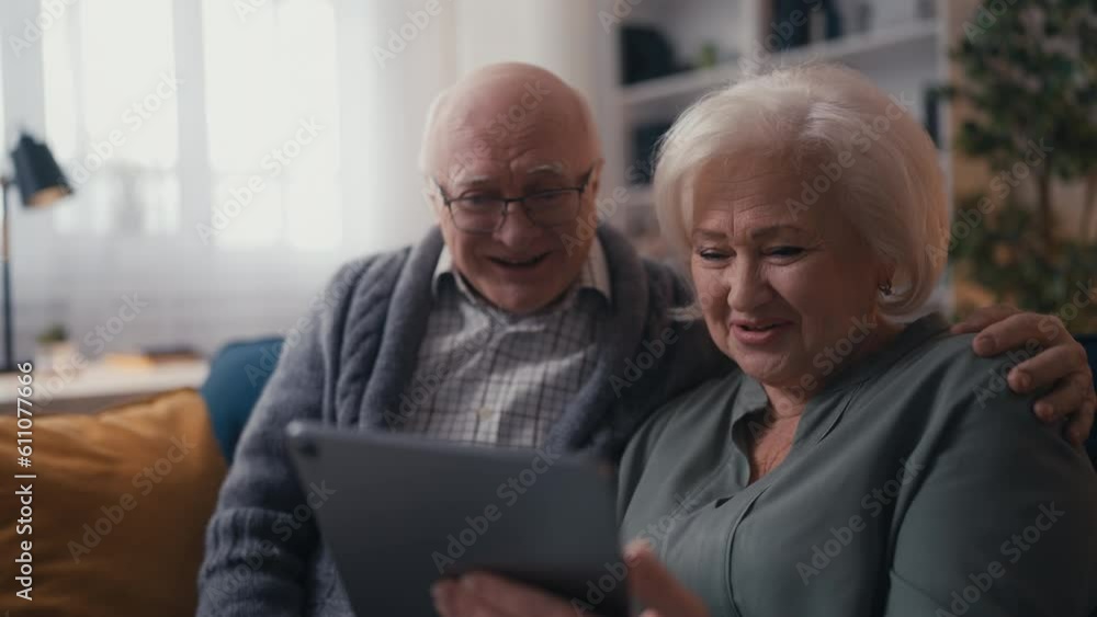 Happy husband and wife communicating with children via video call, family time Happy husband and wife communicating with children via video call, family time