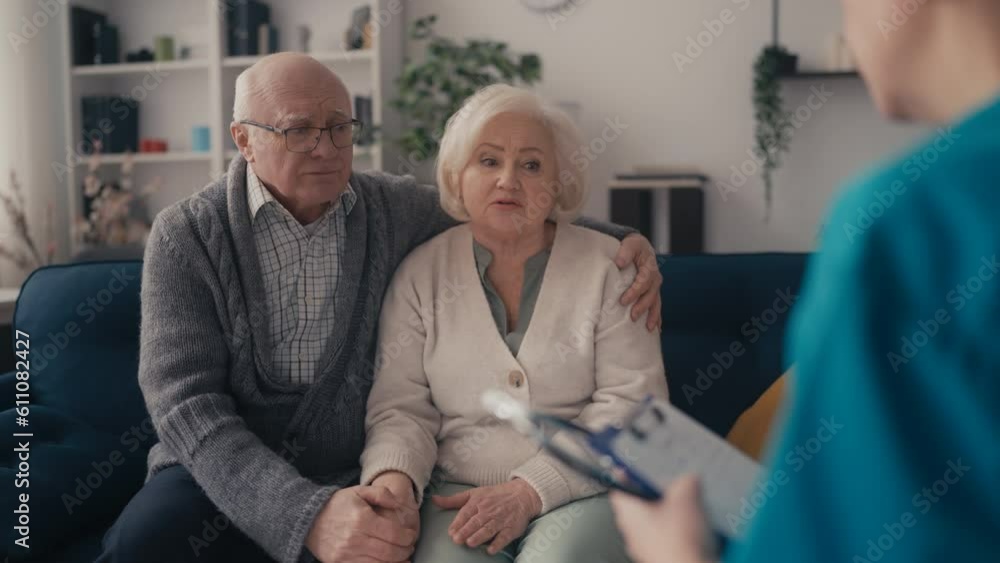 Senior wife and husband communicating with female doctor at home, treatment Senior wife and husband communicating with female doctor at home, treatment