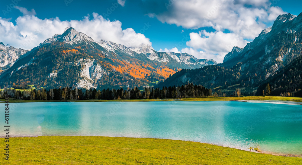 beautiful fairytale landscape of swiss mountains on perfect day with a big lake