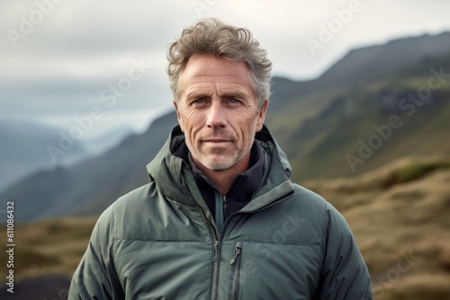 Lifestyle portrait photography of a glad mature boy wearing a lightweight windbreaker against a national park background. With generative AI technology © Markus Schröder