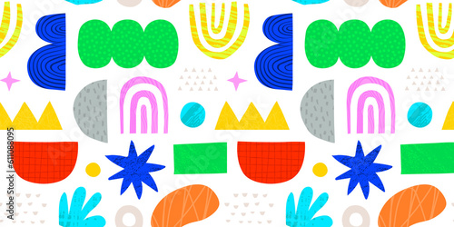 Abstract organic shape seamless pattern with colorful geometric doodles. Flat cartoon background, simple random shapes in bright childish colors. © Dedraw Studio