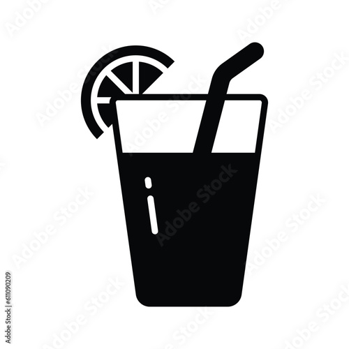 A glass of fresh drink with piece of lemon showing concept icon of summer drink