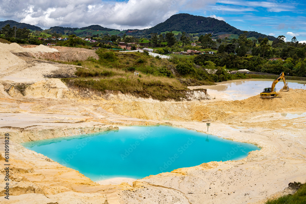 Fototapeta premium Open foundation kaolin mine - Extraction of white mud and clay