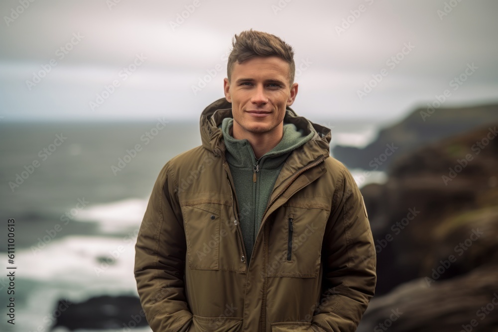 Medium shot portrait photography of a satisfied boy in his 30s wearing a warm parka against a scenic ocean cliff background. With generative AI technology Medium shot portrait photography of a satisfied boy in his 30s wearing a warm parka against a scenic ocean cliff background. With generative AI technology