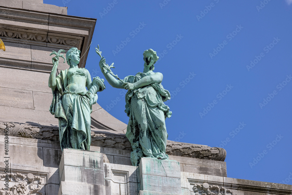 Sculptures on the base of triumphal arch Cinquantenaire Arch, Brussels, Belgium