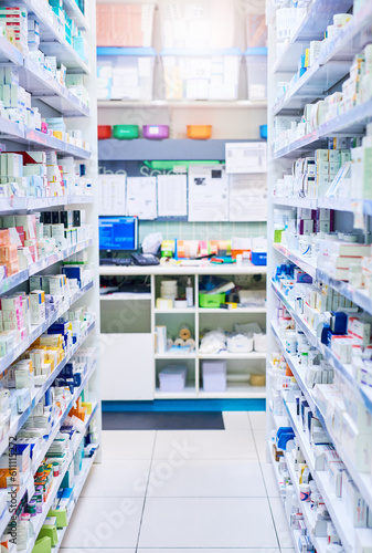 Pharmacy, shelf and boxes for wellness, empty or pharmaceutical stock for product, health and interior. Shop, store and retail healthcare with storage, choice or sale for pharma, discount and drugs © Tamani Chithambo/peopleimages.com