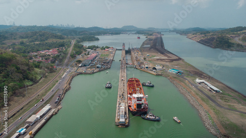 Fotografija Boat passing Pedro Miguel locks in Panama, famous channel shortcut in central America