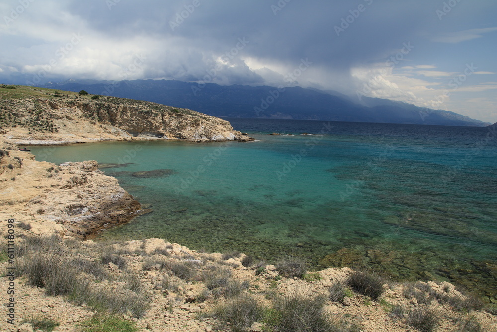 Stony wild Kastelina beach on the island of Rab in Croatia