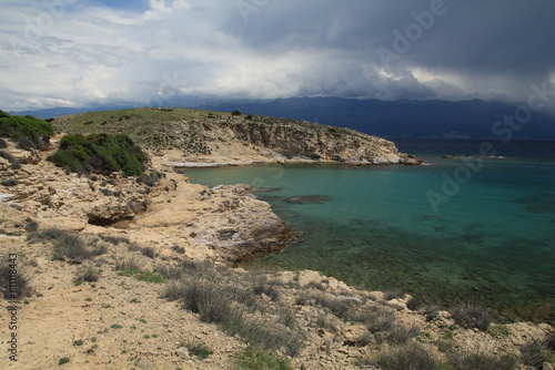 Stony wild Kastelina beach on the island of Rab in Croatia