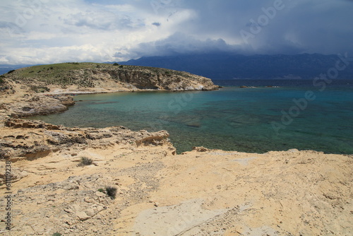 Stony wild Kastelina beach on the island of Rab in Croatia