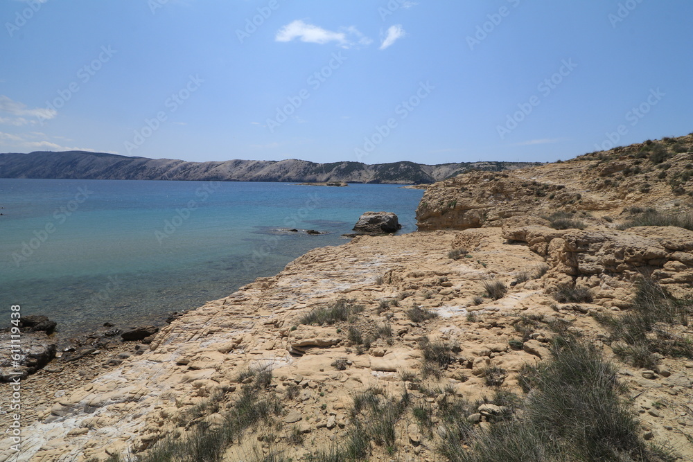 Stony wild Kastelina beach on the island of Rab in Croatia Stony wild Kastelina beach on the island of Rab in Croatia