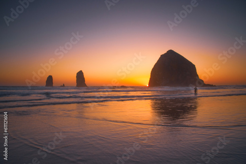 sunset over haystack rock at cannon beach 