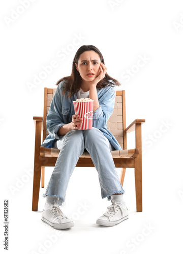 Upset young woman with popc...