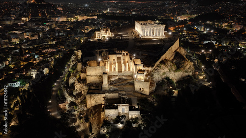 Aerial drone night shot of Acropolis hill propylaea propylea or propylaia entrance gateway, Athens, Attica, Greece photo