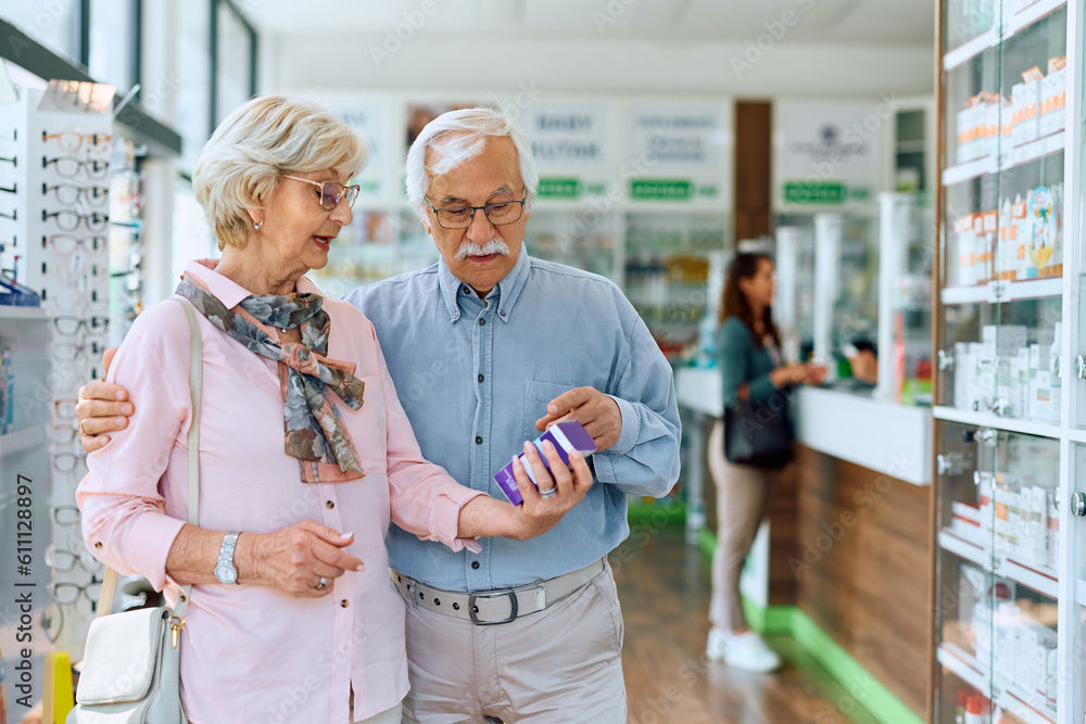 Senior couple buying medicine in pharmacy. Senior couple buying medicine in pharmacy.