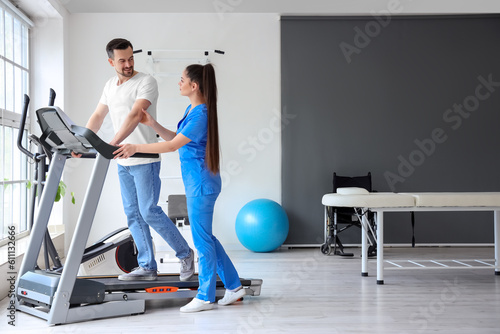 Female physiotherapist work...