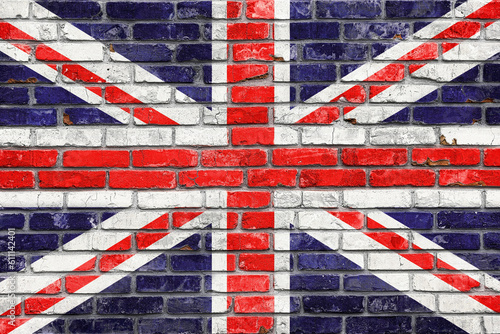 The grunge British Union Jack flag on brick wall textures