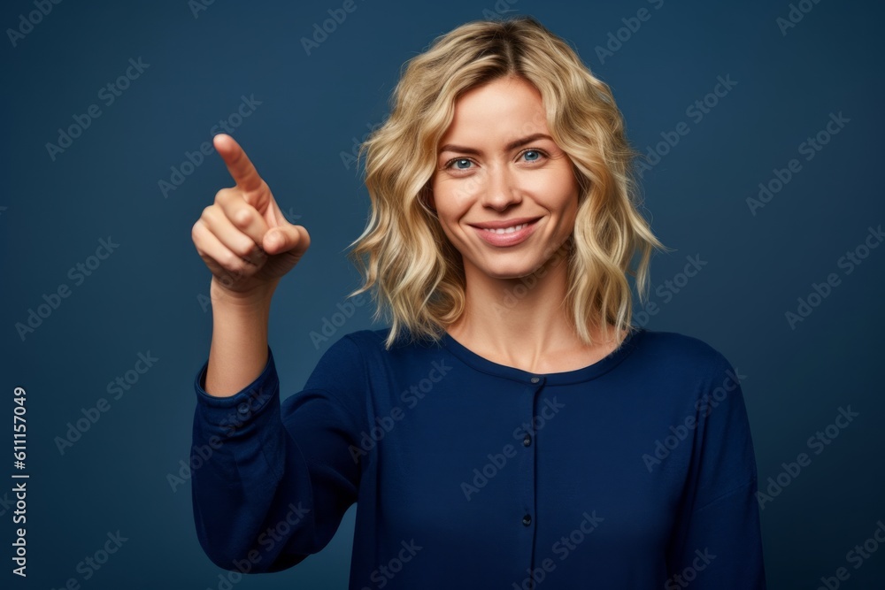 Fototapeta premium Close-up portrait photography of a satisfied girl in her 30s pointing at oneself against a royal blue background. With generative AI technology