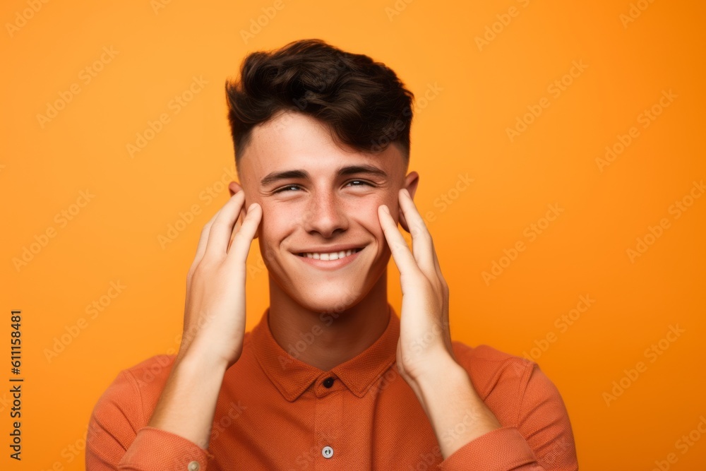 Medium shot portrait photography of a grinning boy in his 20s holding the hand on the forehead in a headache gesture against a bright orange background. With generative AI technology Medium shot portrait photography of a grinning boy in his 20s holding the hand on the forehead in a headache gesture against a bright orange background. With generative AI technology